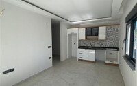 Квартира 1+1 площадью 55 м² в популярном районе Махмутлар-id-9484-фото-2