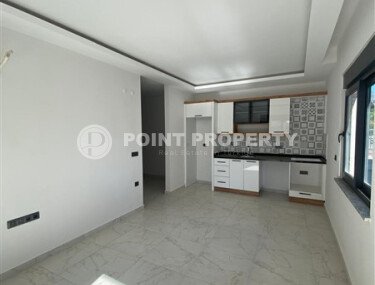 Квартира 1+1 площадью 55 м² в популярном районе Махмутлар-id-9484-фото-2