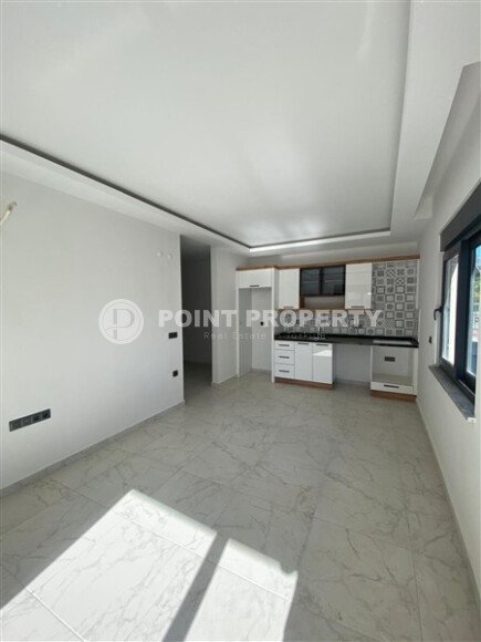 Квартира 1+1 площадью 55 м² в популярном районе Махмутлар-id-9484-фото-2