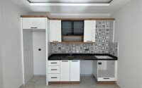 Квартира 1+1 площадью 55 м² в популярном районе Махмутлар-id-9484-фото-3
