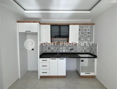Квартира 1+1 площадью 55 м² в популярном районе Махмутлар-id-9484-фото-3