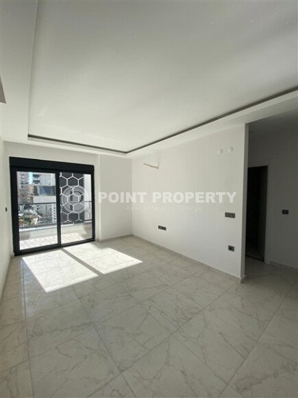 Квартира 1+1 площадью 55 м² в популярном районе Махмутлар-id-9484-фото-4