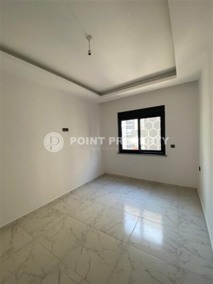 Квартира 1+1 площадью 55 м² в популярном районе Махмутлар-id-9484-фото-5