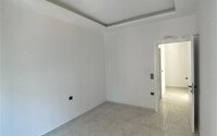 Квартира 1+1 площадью 55 м² в популярном районе Махмутлар-id-9484-фото-6