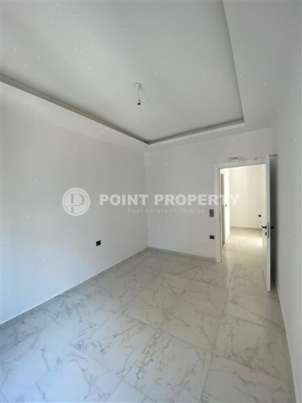 Квартира 1+1 площадью 55 м² в популярном районе Махмутлар-id-9484-фото-6