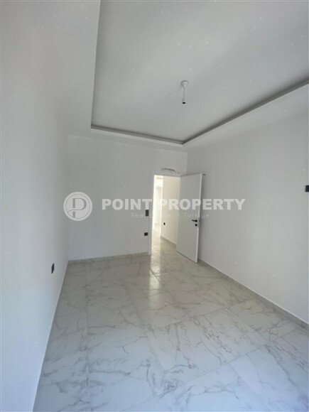 Квартира 1+1 площадью 55 м² в популярном районе Махмутлар-id-9484-фото-7