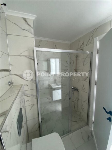 Квартира 1+1 площадью 55 м² в популярном районе Махмутлар-id-9484-фото-8