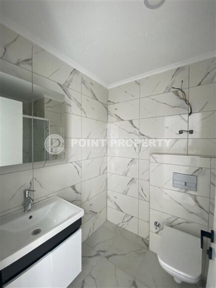 Квартира 1+1 площадью 55 м² в популярном районе Махмутлар-id-9484-фото-9