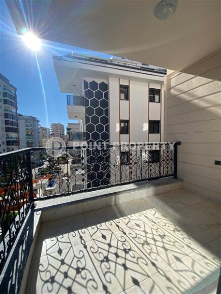 Квартира 1+1 площадью 55 м² в популярном районе Махмутлар-id-9484-фото-10