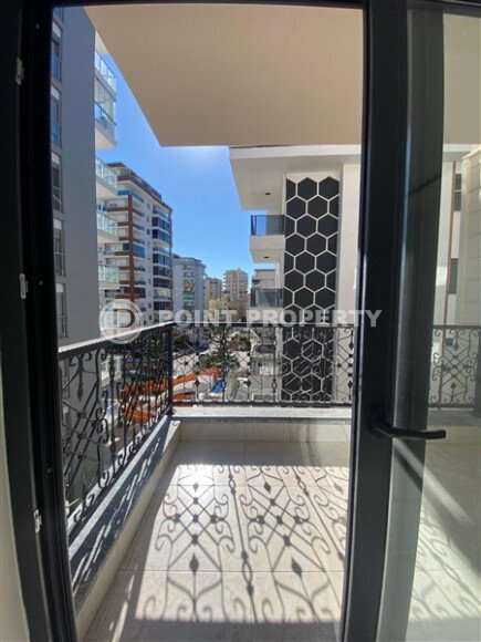 Квартира 1+1 площадью 55 м² в популярном районе Махмутлар-id-9484-фото-11