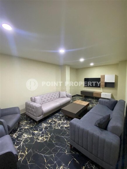 Квартира 1+1 площадью 55 м² в популярном районе Махмутлар-id-9484-фото-12