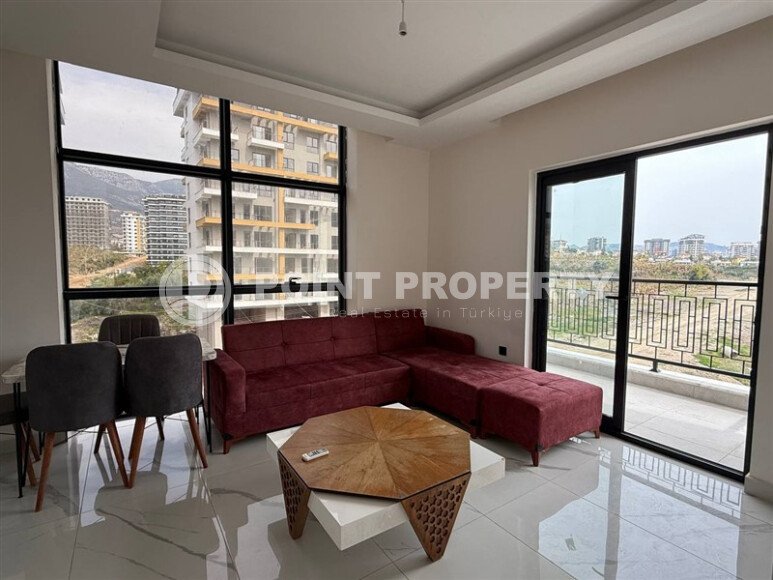 Квартира 1+1 площадью 55 м² в популярном районе Махмутлар, Алания-id-9486-фото-2