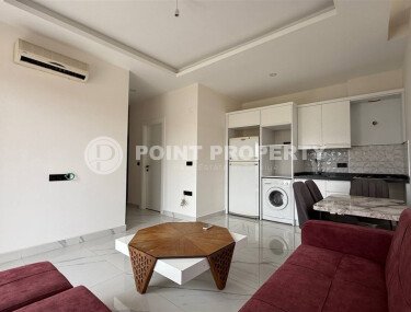 Квартира 1+1 площадью 55 м² в популярном районе Махмутлар, Алания-id-9486-фото-4