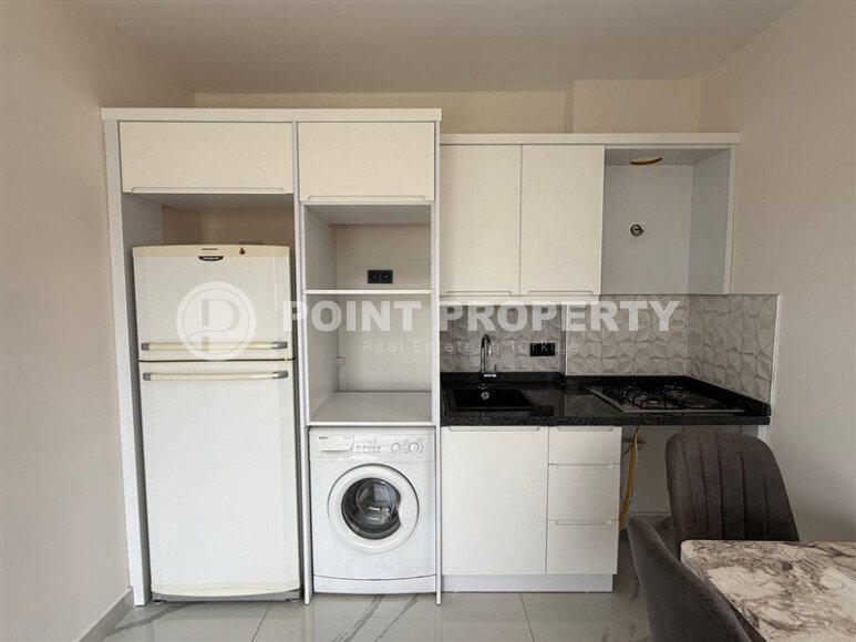 Квартира 1+1 площадью 55 м² в популярном районе Махмутлар, Алания-id-9486-фото-5