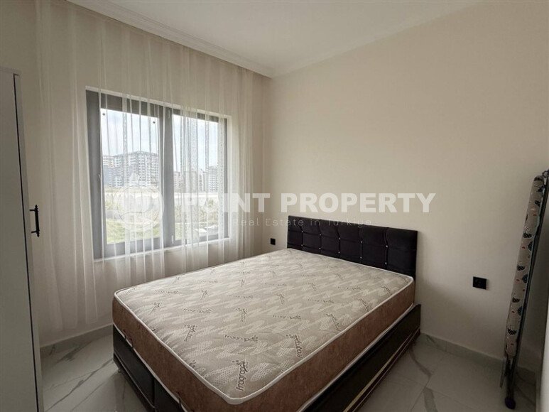 Квартира 1+1 площадью 55 м² в популярном районе Махмутлар, Алания-id-9486-фото-6