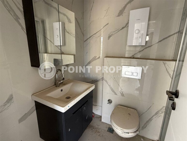 Квартира 1+1 площадью 55 м² в популярном районе Махмутлар, Алания-id-9486-фото-9