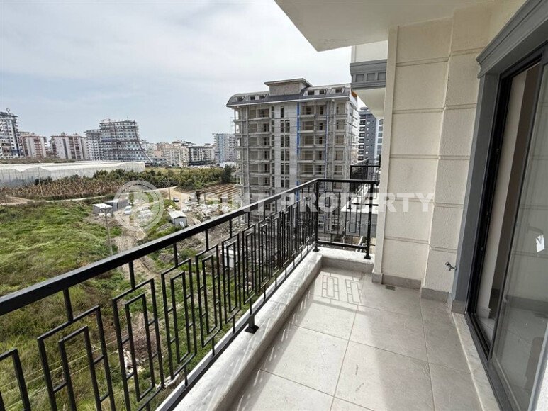 Квартира 1+1 площадью 55 м² в популярном районе Махмутлар, Алания-id-9486-фото-11