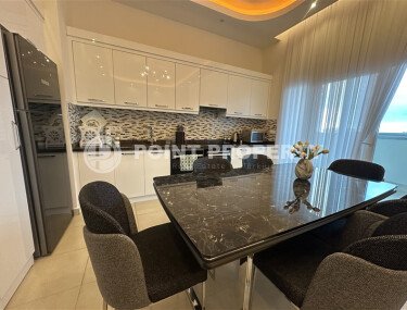 Комфортная квартира 2+1 площадью 135 м² от престижного застройщика в районе Махмутлар-id-9487-фото-3