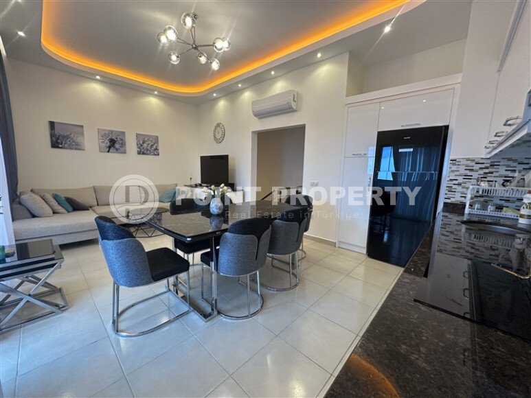 Комфортная квартира 2+1 площадью 135 м² от престижного застройщика в районе Махмутлар-id-9487-фото-4