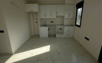 Современная квартира 1+1 в районе Махмутлар, 50 м²-id-9492-фото-2