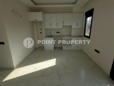 Современная квартира 1+1 в районе Махмутлар, 50 м²-id-9492-фото-2