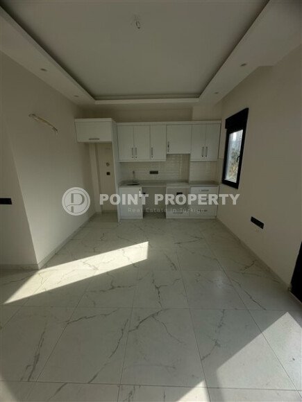 Современная квартира 1+1 в районе Махмутлар, 50 м²-id-9492-фото-2