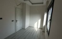 Современная квартира 1+1 в районе Махмутлар, 50 м²-id-9492-фото-3