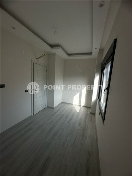 Современная квартира 1+1 в районе Махмутлар, 50 м²-id-9492-фото-3