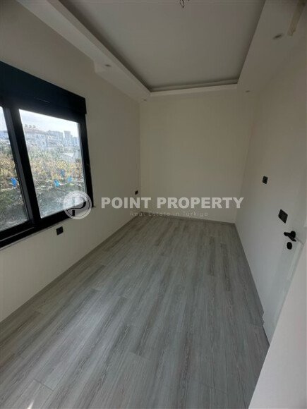 Современная квартира 1+1 в районе Махмутлар, 50 м²-id-9492-фото-6