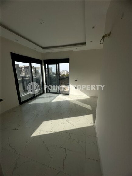 Современная квартира 1+1 в районе Махмутлар, 50 м²-id-9492-фото-7