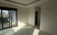 Современная квартира 1+1 в районе Махмутлар, 50 м²-id-9492-фото-8