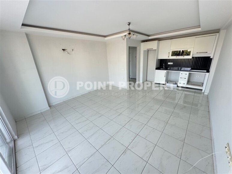 Недорогая квартира с красивым видом на горы в районе Махмутлар-id-9496-фото-4