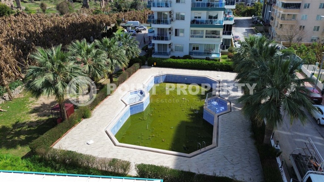 Недорогая квартира с красивым видом на горы в районе Махмутлар-id-9496-фото-11