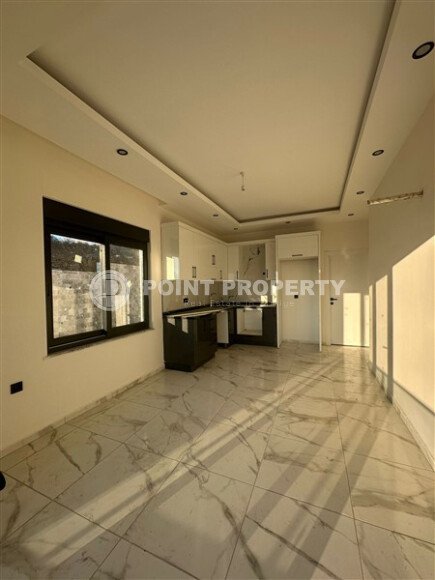 Квартира 1+1 с частичным видом на море в районе Демирташ-id-9498-фото-4