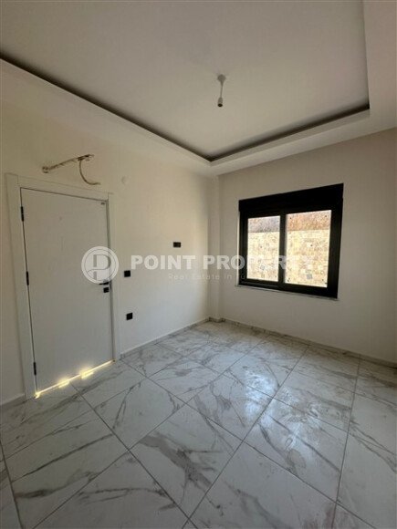 Квартира 1+1 с частичным видом на море в районе Демирташ-id-9498-фото-5