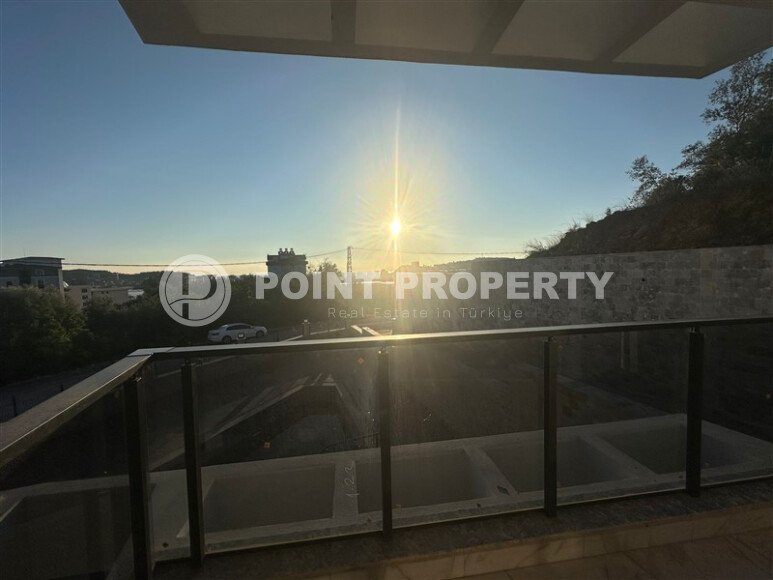 Квартира 1+1 с частичным видом на море в районе Демирташ-id-9498-фото-10