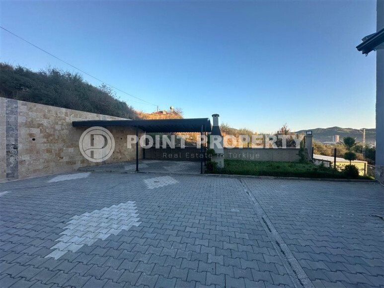 Квартира 1+1 с частичным видом на море в районе Демирташ-id-9498-фото-12