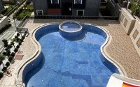 Duplex apartment 2+1 with sea view and designer renovation in Buyukhasbahce, possibility of obtaining a residence permit-id-9499-photo-1