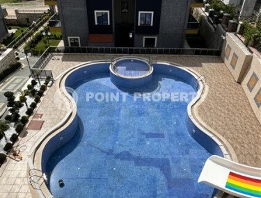 Duplex apartment 2+1 with sea view and designer renovation in Buyukhasbahce, possibility of obtaining a residence permit-id-9499-photo-1