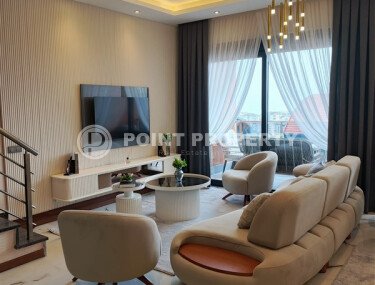 Двухуровневая квартира 2+1 с видом на море и дизайнерским ремонтом в Бююкхасбахче, возможность получения ВНЖ-id-9499-фото-2