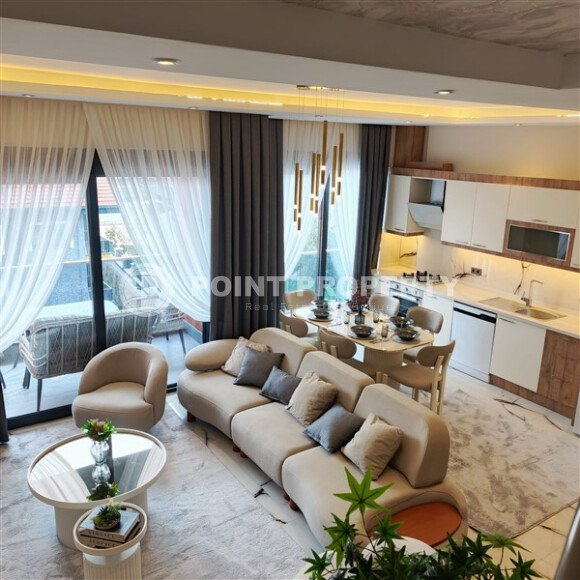 Двухуровневая квартира 2+1 с видом на море и дизайнерским ремонтом в Бююкхасбахче, возможность получения ВНЖ-id-9499-фото-3