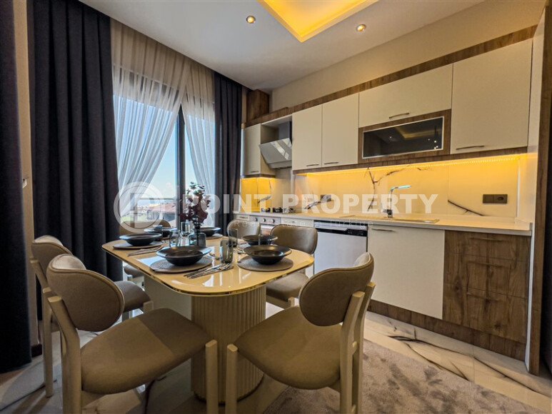 Двухуровневая квартира 2+1 с видом на море и дизайнерским ремонтом в Бююкхасбахче, возможность получения ВНЖ-id-9499-фото-4