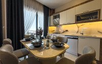 Duplex apartment 2+1 with sea view and designer renovation in Buyukhasbahce, possibility of obtaining a residence permit-id-9499-photo-5