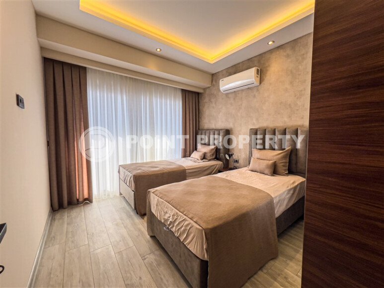 Двухуровневая квартира 2+1 с видом на море и дизайнерским ремонтом в Бююкхасбахче, возможность получения ВНЖ-id-9499-фото-8