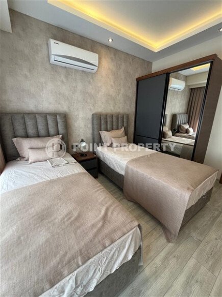 Двухуровневая квартира 2+1 с видом на море и дизайнерским ремонтом в Бююкхасбахче, возможность получения ВНЖ-id-9499-фото-9