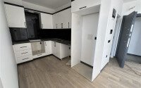 Квартиры от 58 м² в новом жилом комплексе в районе Махмутлар-id-9501-фото-3