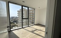 Квартиры от 58 м² в новом жилом комплексе в районе Махмутлар-id-9501-фото-5