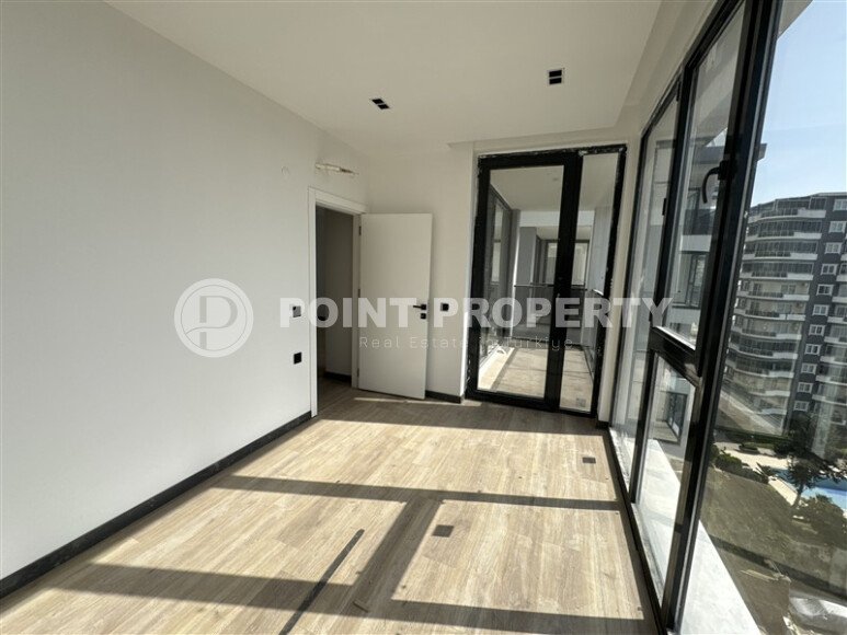 Квартиры от 58 м² в новом жилом комплексе в районе Махмутлар-id-9501-фото-8