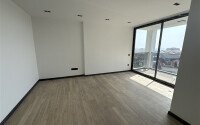 Квартиры от 58 м² в новом жилом комплексе в районе Махмутлар-id-9501-фото-9