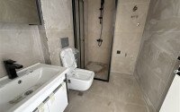 Квартиры от 58 м² в новом жилом комплексе в районе Махмутлар-id-9501-фото-10